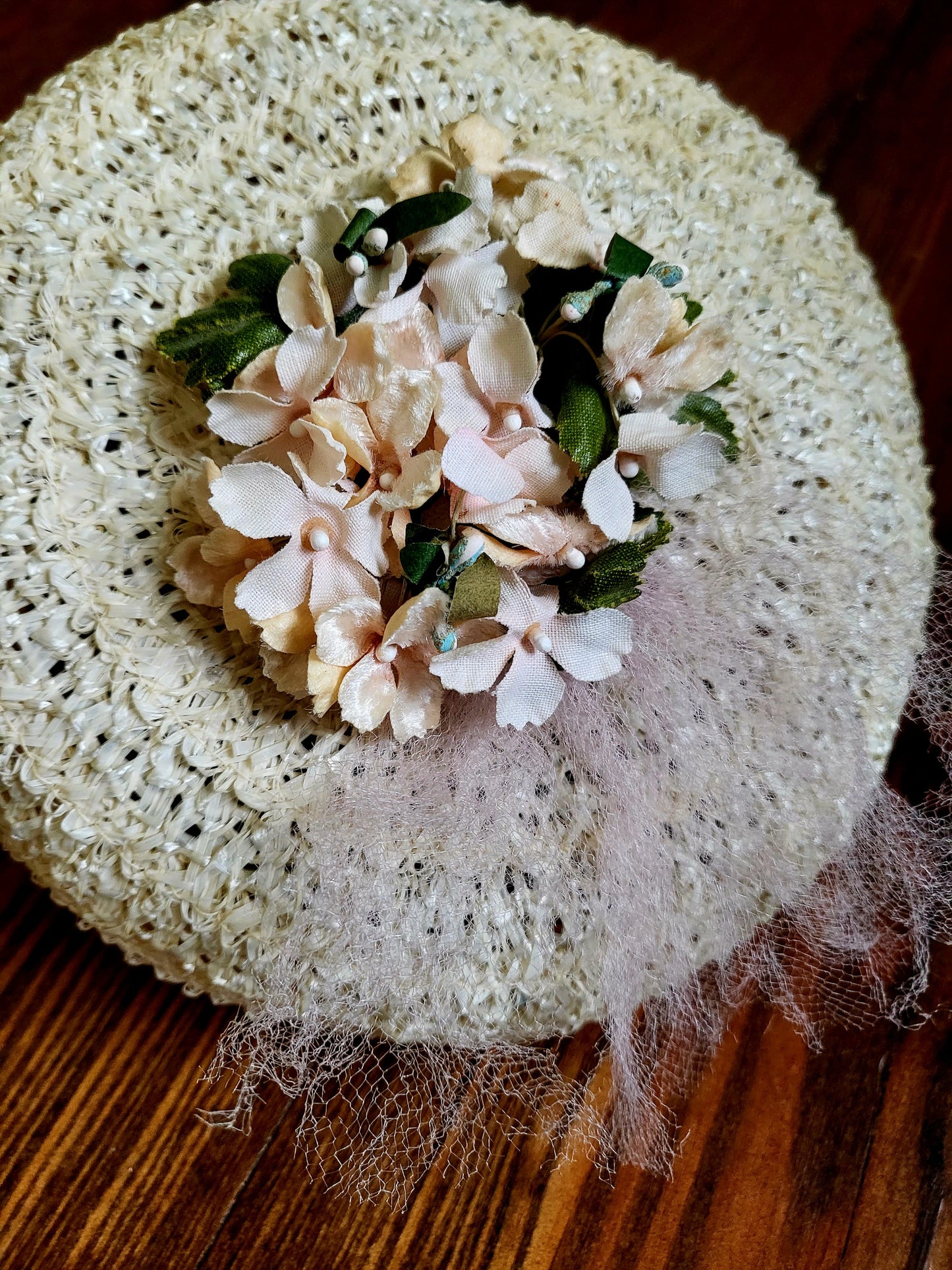 HAT10 - Vintage 1950s-1960s Cinderella Ivory Straw Weave Topper with Pale Pink Flower Adornment and Pink Netting