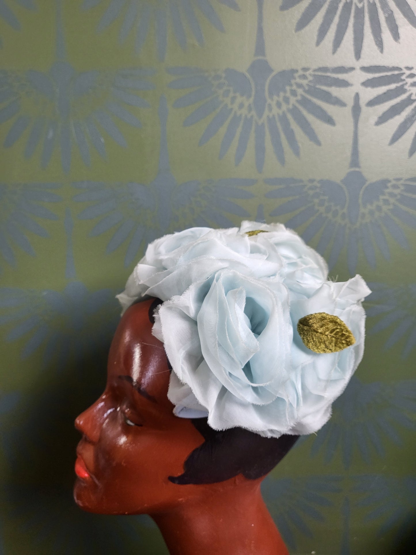 HAT6 - Vintage 1950s-1960s Pale Baby Blue Rosette and Olive Green Velvet Leaf Detail Crescent Topper